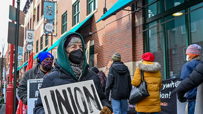 Union workers protesting. Photo by Creative Commons. 