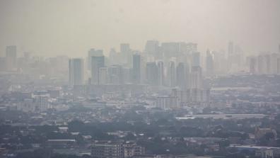 Smog mixed with a thick layer of clouds covers the Metro Manila skyline in the Philippines.
