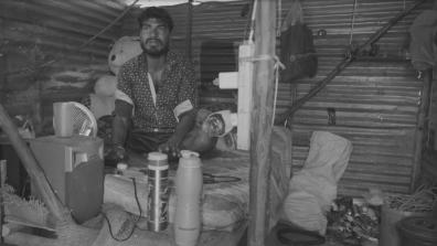 A picture of a man in his home in India