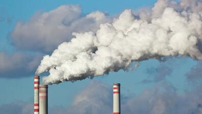 Factory chimneys with smoke coming out