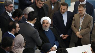 President Hassan Rouhani, center, attends a ceremony to inaugurate Azadi Innovation Factory in Pardis technology park in west of Tehran, Iran