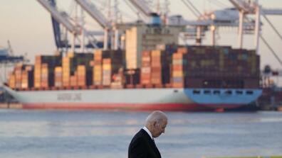Image of President Joe Biden with a freighter in the background