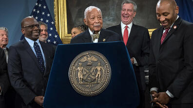 Former NYC Mayor David N. Dinkins standing with current Mayor Bill de Blasio