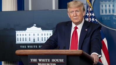trump at a podium