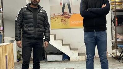 From left to right Imran Qureshi & Ambassador Suljuk Mustansar Tarar in Qureshi's studio