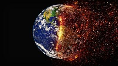 Image of the Earth as half of it is burning
