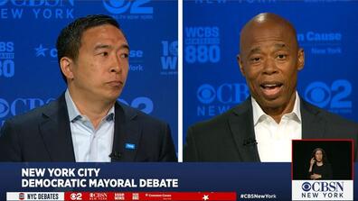 Andrew Yang (left) and Brooklyn Borough President Eric Adams participate in the New York City Democratic Primary Mayoral Debate