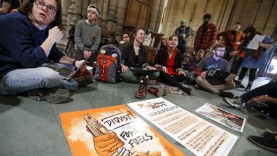 In February, students and activists protested in the Cathedral of Learning on the University of Pittsburgh campus to urge the school's board of trustees to divest from fossil fuels.KEITH SRAKOCIC/ASSOCIATED PRESS