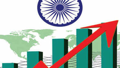 A graph showing economic growth with a world map on the back, and the Ashoka Chakra wheel depicted on the flag of India on top