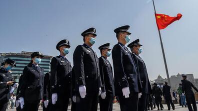Chinese soldiers wearing masks