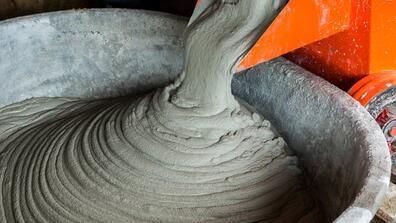 Concrete is poured into a vat