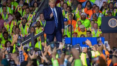 President Donald Trump walks on stage before speaking to a crowd of construction workers before touring Royal Dutch Shell's petrochemical cracker plant on Aug. 13, 2019 in Monaca, Pa. 