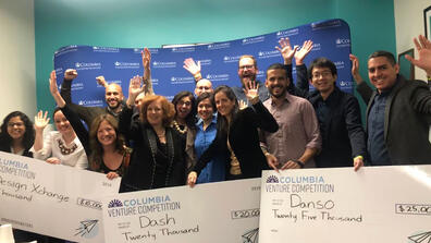 Dean Janow celebrates with winners of the 2019 Dean's Public Policy Challenge.