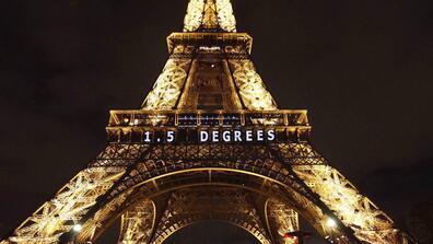 Eiffel tower with 1.5 degrees displayed on it