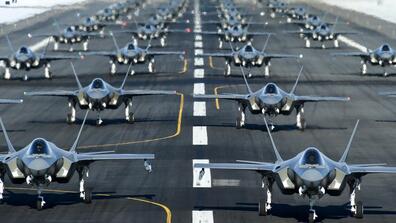 fighter jets on a runway