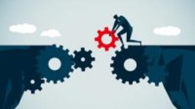 An illustration of a person lays down gears in a path