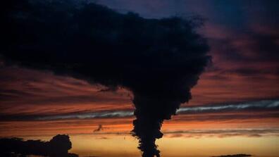 A big amount of emitted greenhouse gases going up to the sky
