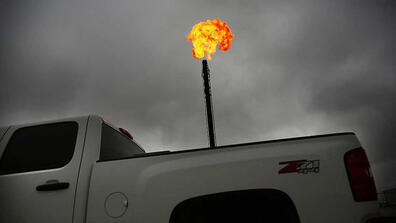 Flared natural gas is burned off Feb. 5, 2015 at the Deadwood natural gas plant in Garden City, Texas.