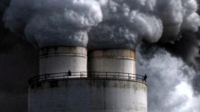 smoke comes out of a smokestack
