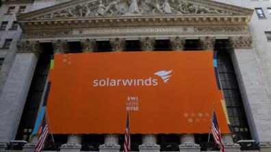 a solarwinds company banner hangs on the new york stock exchange