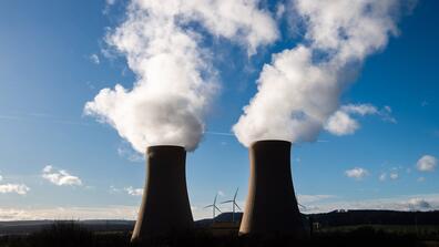 Steam rises from the cooling towers of the Grohnde nuclear power plant in Germany on Jan. 21, 2021. JULIAN STRATENSCHULTE/PICTURE ALLIANCE VIA GETTY IMAGES