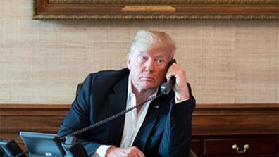 President Trump speaks on the telephone