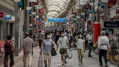 People at a market street in Japan