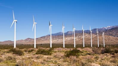 wind turbines against a blue sky