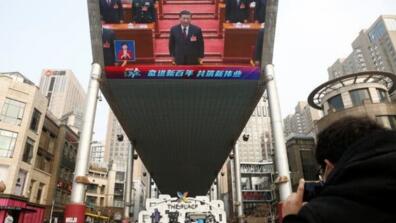 Xi Jinping  on a large screen