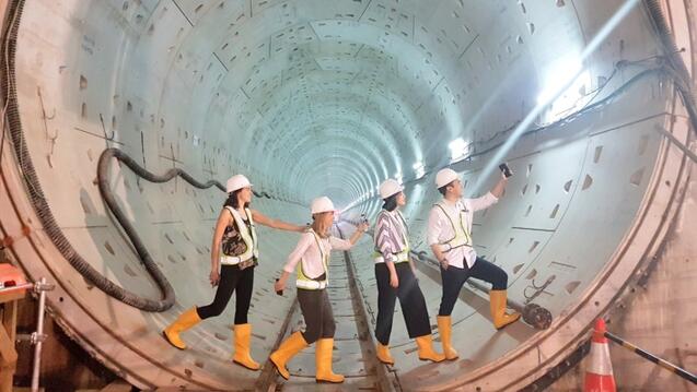 students walking in a dome