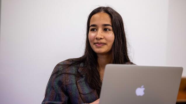 SIPA student with laptop