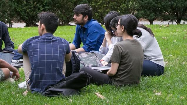 MPA-ESP Student sitting on a lawn