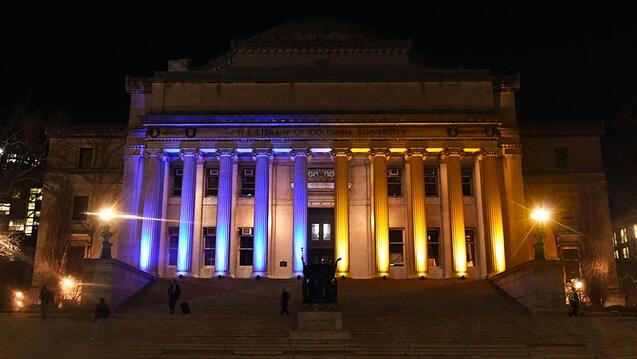 Through the month of March 2022, Low Library was illuminated in the colors of the Ukrainian flag, marking the university's support for the Ukrainian people in the face of the ongoing invasion of their country by Russian forces. (Photo by Eileen Barroso)