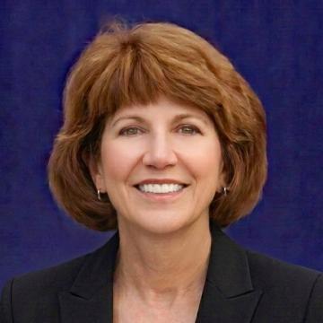Prof. Cynthia Roberts, smiling in headshot