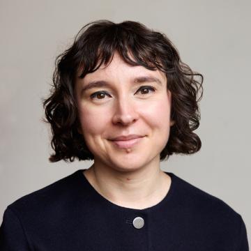Headshot of Amanda Stanhaus against a neutral background.