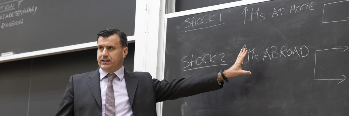 professor teaching at blackboard