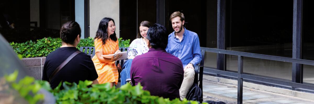 students talking outside