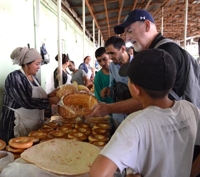 Glenn Denning visiting a market in Tajikistan in 2018 as part of a SIPA-led advisory project supported by the UN World Food Programme.