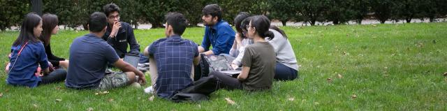 MPA-ESP Student sitting on a lawn