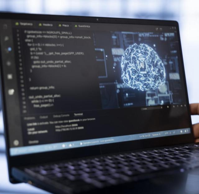 computer-scientist-using-laptop-data-center-updating-ai
