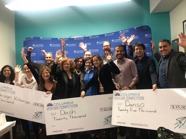 Dean Janow celebrates with winners of the 2019 Dean's Public Policy Challenge. [click to enlarge]
