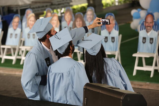 Students take photos on Butler Lawn
