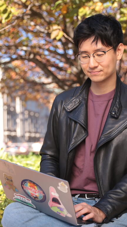SIPA Student on Laptop